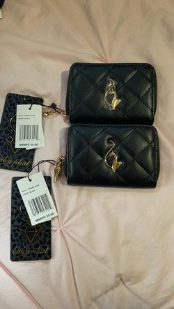 brand new ed hardy and baby phat wallets .