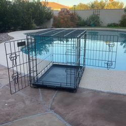 Collapsible Dog Cage/Crate/Carrier 24 Inches Long 17 Inches Wide And 19 Inches  Tall.         (2 Locking Doors And A Divider)