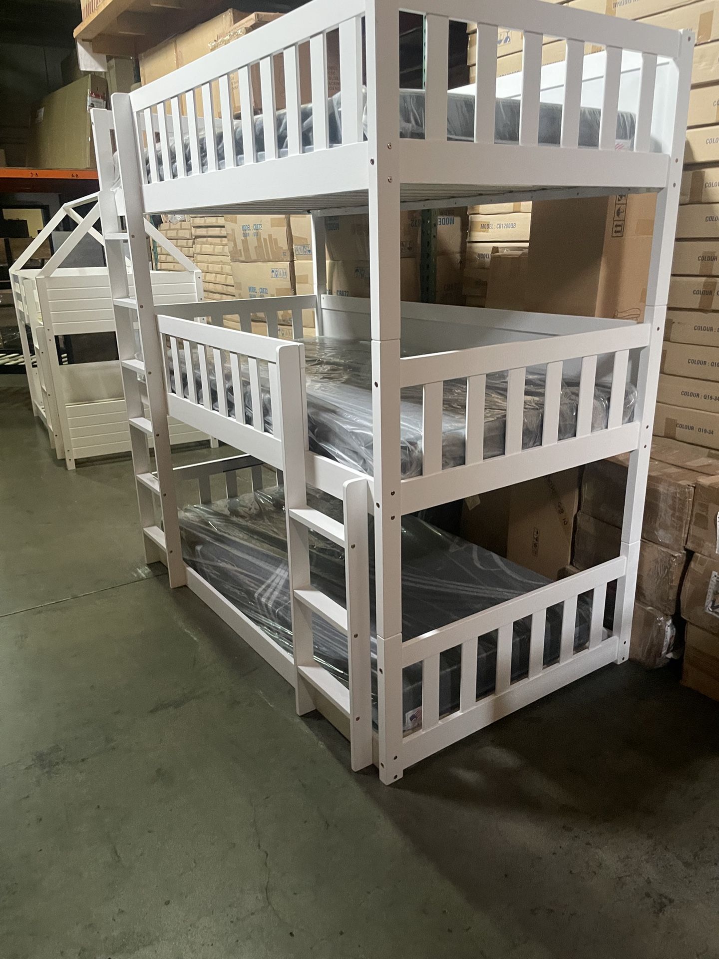 Triple bunk bed. Available in white & espresso. Assembly required. Assembly not included. Taxes included. Free delivery. Bunk bed only-$450 Bunk bed