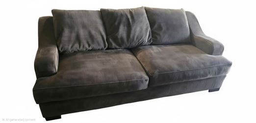 Super comfortable dark gray sofa with matching large ottoman