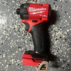Milwaukee fuel 1/4 impact ( tool only)