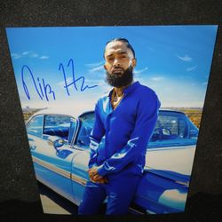 NIPSEY HUSTLE AUTOGRAPHED 8X10 PHOTO & COA 