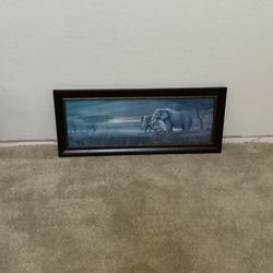 Kirkland framed pictures behind glass