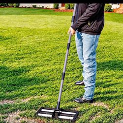 New in box Lawn Leveling Rake with Aluminum rollers. Brand new
