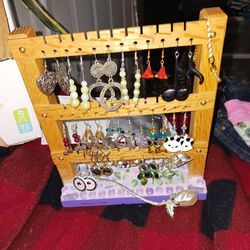 17 Pair Of Earrings Three Brooches And A Jewelry Rack All Together