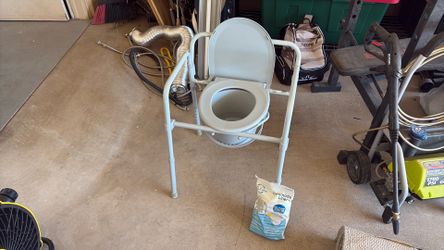bedside commode (portable toilet)