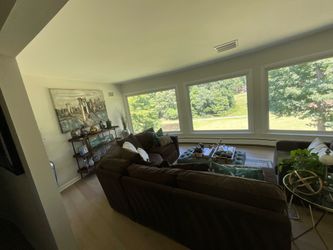 Chocolate sectional with club chair