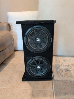 Two 10-in kicker competitions inside a Rockville 10-in dual subwoofer enclosure