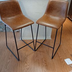 Two Matching Leather Tall Countertop Barstools 