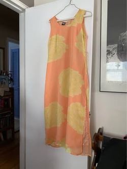 Peach sundress with yellow flowers size small