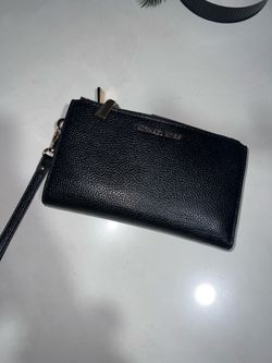 black michael kors wallet medium size.