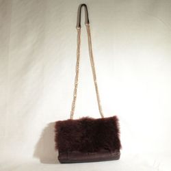 TED BAKER Fuzzi Shearling Cross Body Bag. Great used condition.  Wear on corners other than that looks great