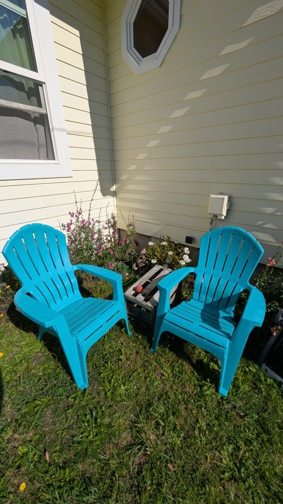 2 Plastic Adirondack Chairs
