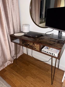 Elegant gold and wood desk perfect for apartment