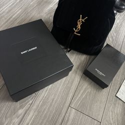 Saint Laurent backpack, shoes, and wallet