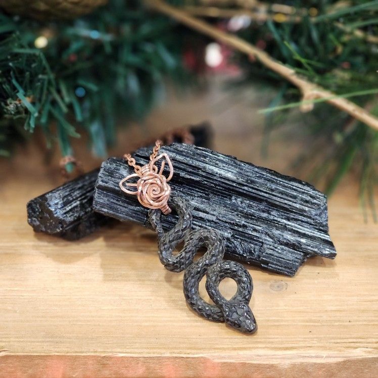 Hand Carved Buffalo Horn Snake In Copper With rose Accent