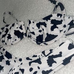 V-neck cami cow print bathing suit top with high waisted bottoms 