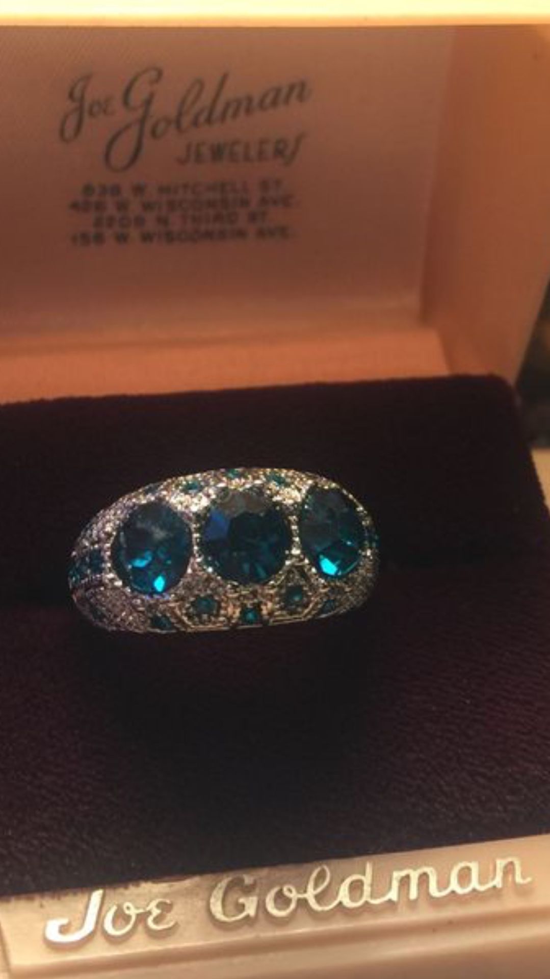 Teal blue sapphires on domed sterling silver band sz7