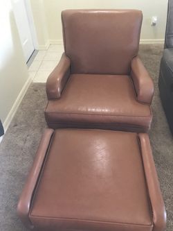 Genuine leather seat with foot rest