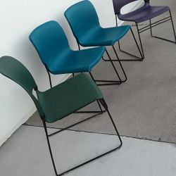 4 Plastic chairs Stackable 