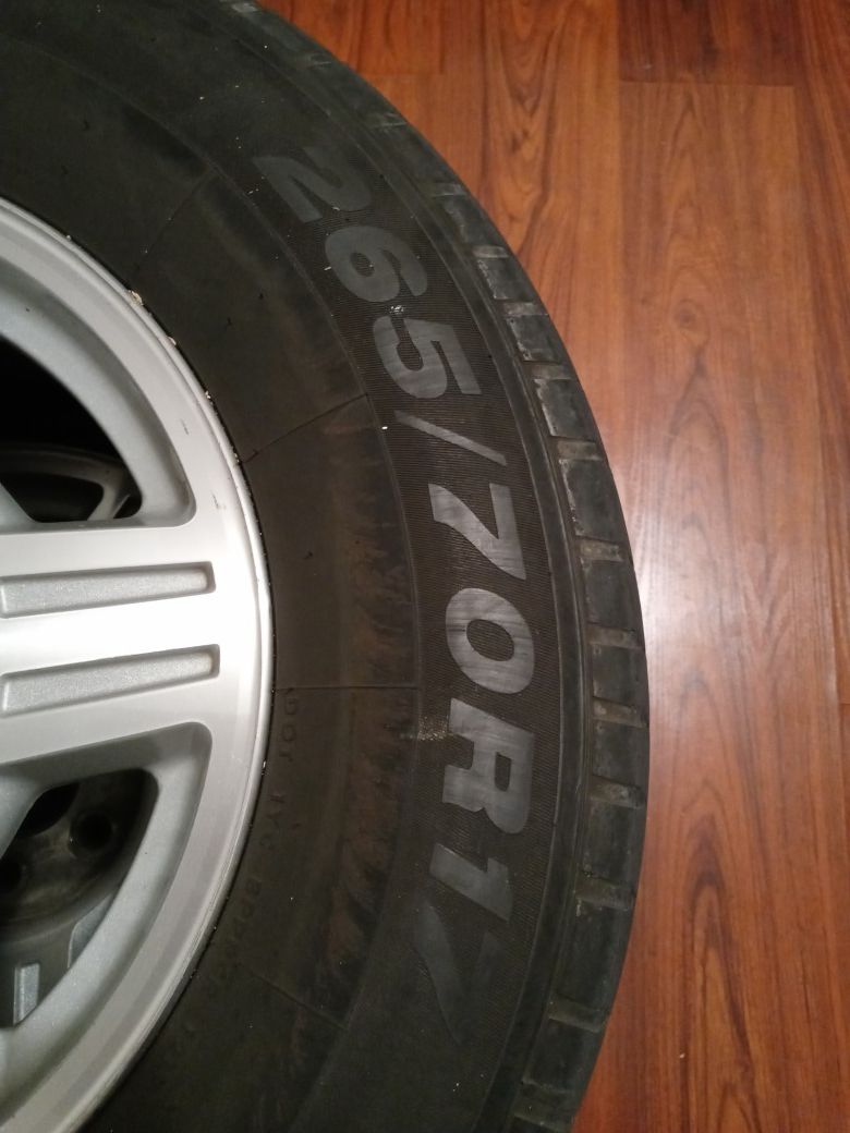 265/70R17 (4) tires & 6hole Chevy Rims