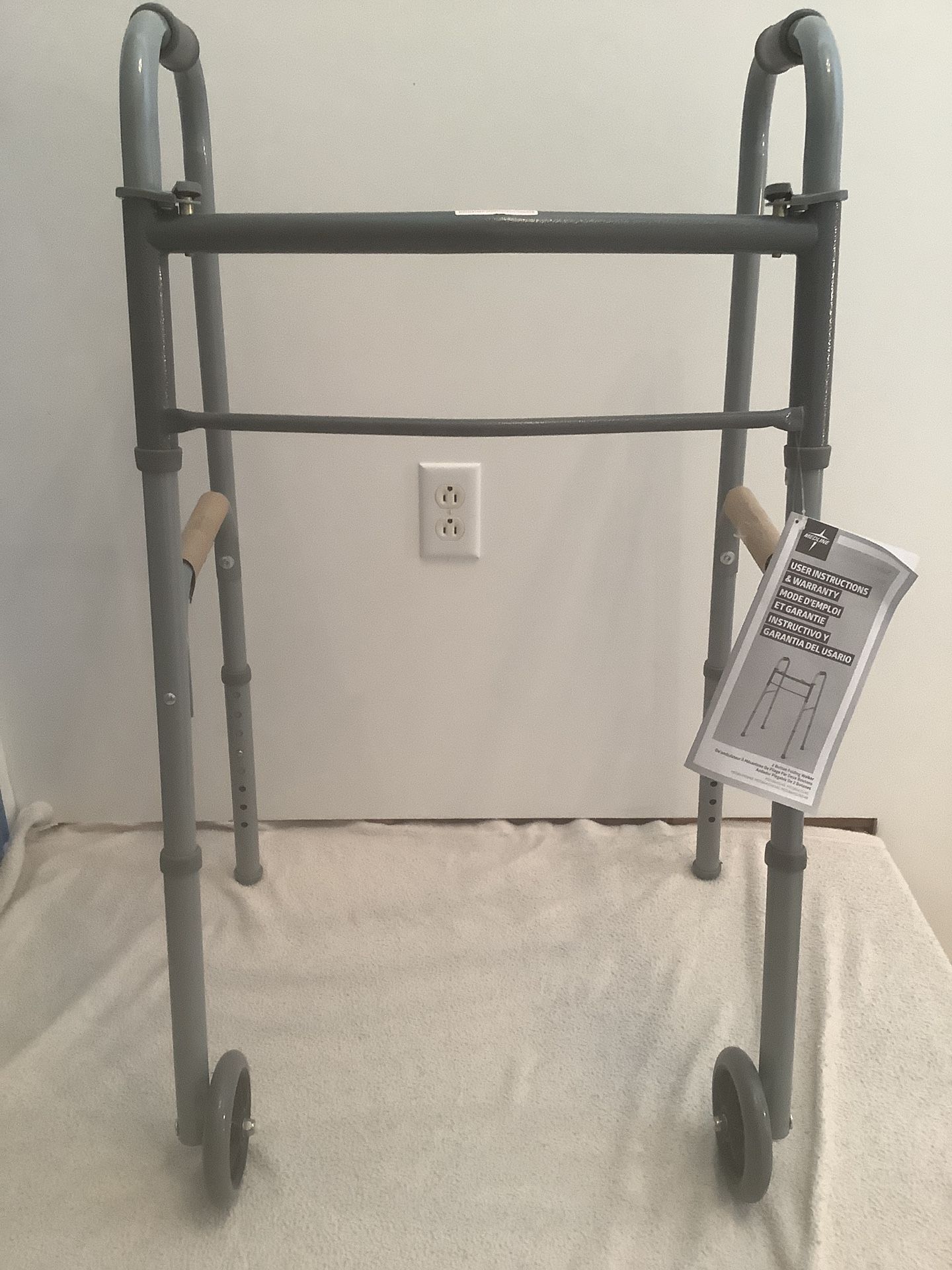 MEDLINE 2 BUTTON FOLDING WALKER MDS864104 & ALUMINUM CRUTCHES MDS51514-10. (SHIPPING AVAILABLE UPON REQUEST)