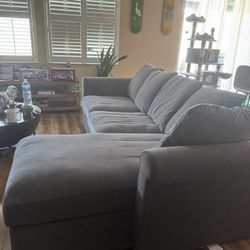 GREY SECTIONAL COUCH WITH STORAGE 