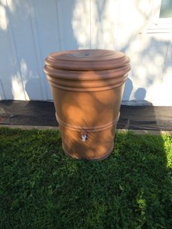 Two Terracotta Rain Barrels