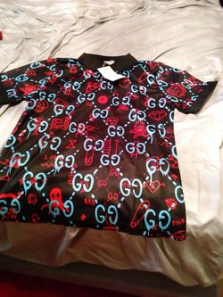 New Gucci polo shirt.medium