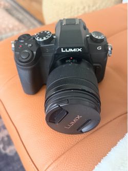 Panasonic Lumix G mirrorless digital camera with bag and tripod