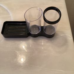 Toothbrusha andToothpaste Holder Plus Hand Soap Holder.