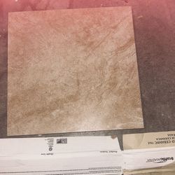 Glazed ceramic tile flooring.  18” x 18”