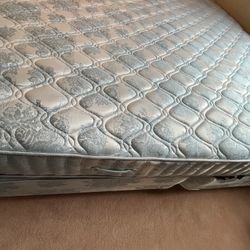 old used king mattress with boxsprings and metal frame