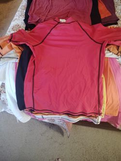 Lot Of Surfing Rashguards