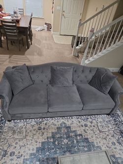 2 grey sofas