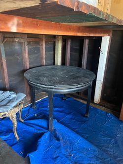 Round black dining table