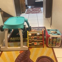 2 Activity Learning Toy and one Small Table on Wheel.  Price 12$.  Pick Up.   E.   Side.   Tacoma  Check My Page For Kids Stuff