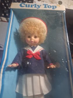 Curly top Eugene doll original wrapper