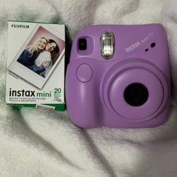Purple Polaroid camera
