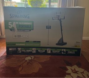 Spalding 54-inch Shatter-Proof Polycarbonate Portable Basketball System, model 60A081.
