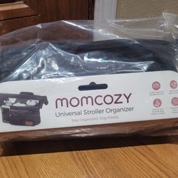 MOMCOZY UNIVERSAL STROLLER ORGANIZER! BRAND NEW STILL IN THE PLASTIC! RETAILS 30