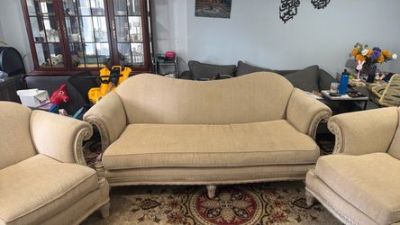sofa and two chairs