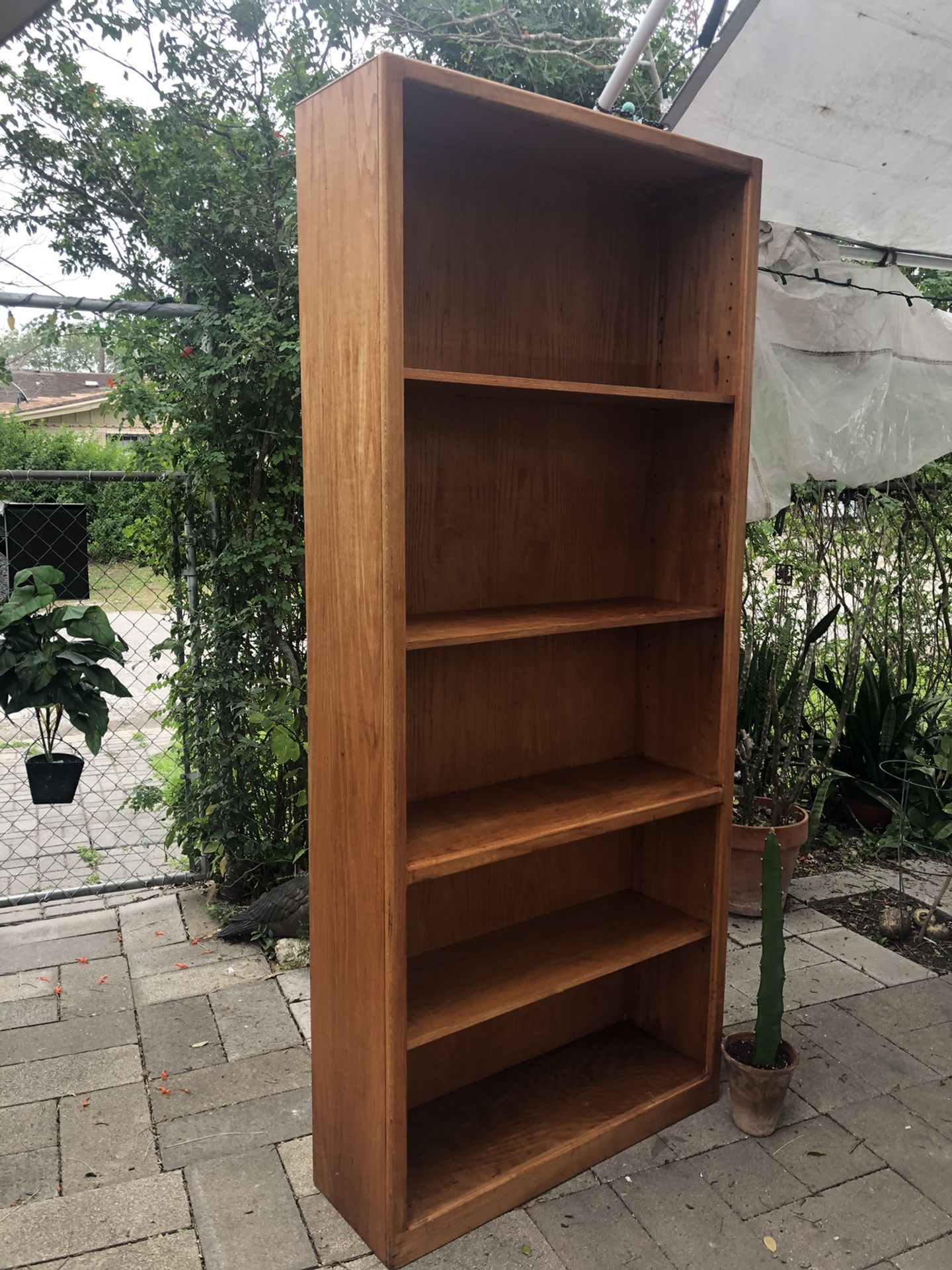 Tall solid wood bookcase with adjustable shelves