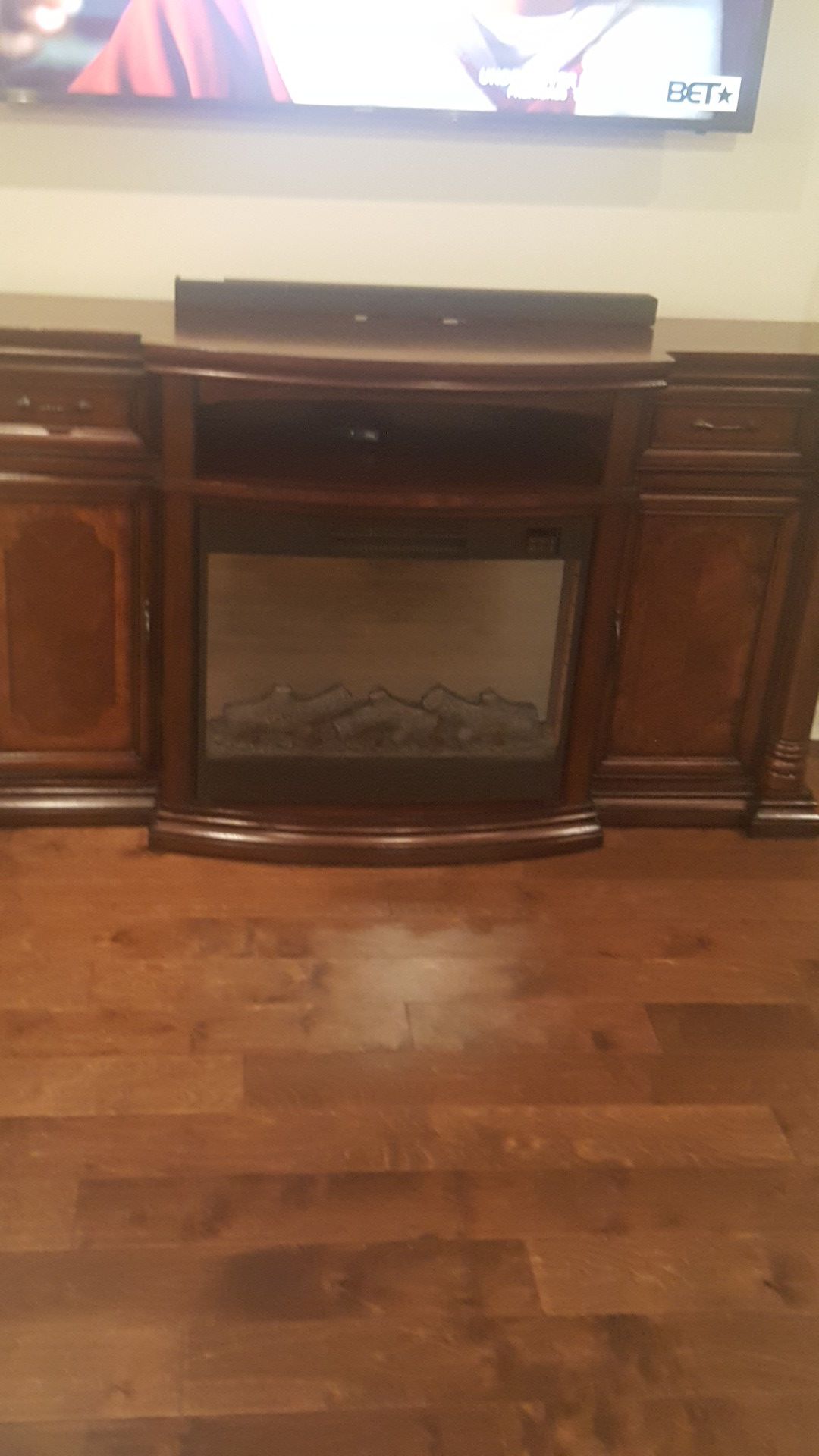 Beautiful cabinet with built in electric fireplace with remote control