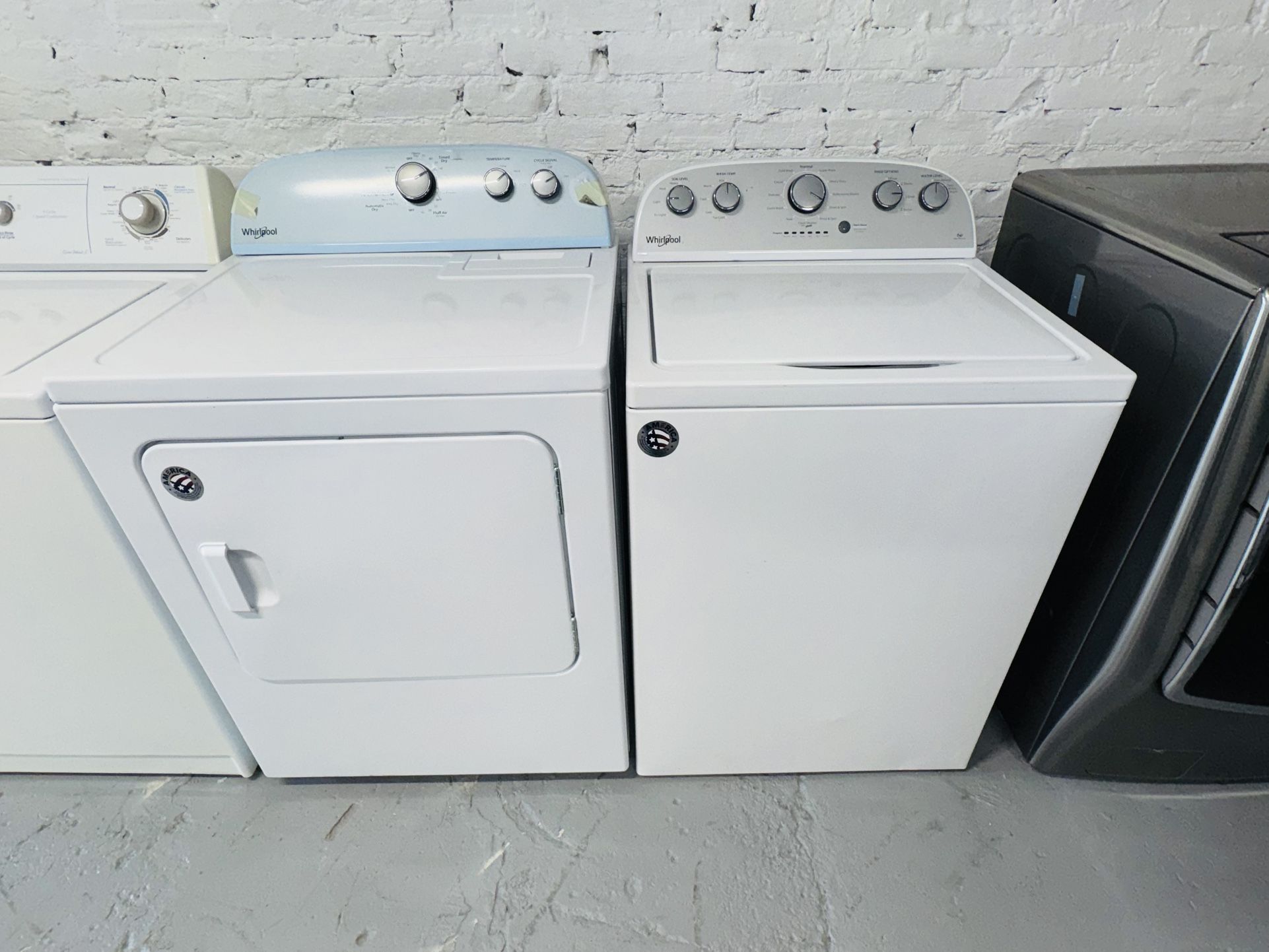 Whirlpool electric washer and dryer, a receipt for a 90-day warranty