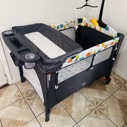 Portable Baby Playard With Changing Table And Music Box