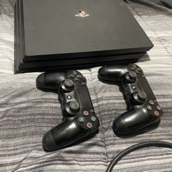 PS4 Pro With Controllers & Games 