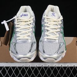 ASICS Gel-Cumulus 16 "Tomo" sneaker in the cream and malachite green colorway.
