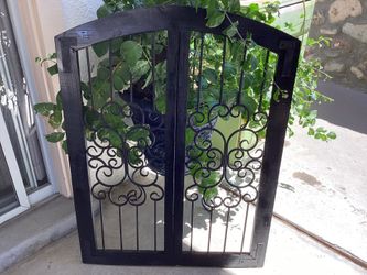 Wood and wrought iron decore window 30x36”