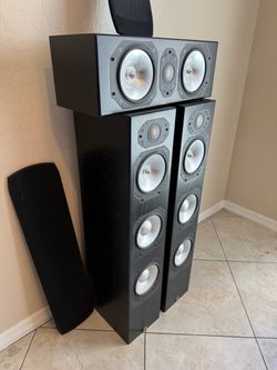 monitor audio  including the two towers in the center speaker model E